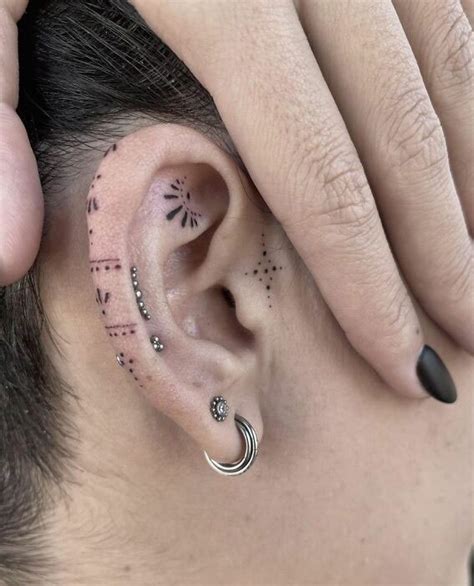 Flower Ear Tattoos With Piercings