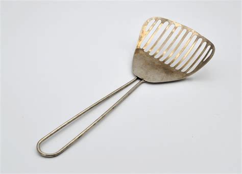 Vintage Slotted Metal Spatula Scoop Spoon Server Cooking Etsy In 2021 Vintage Spatula Metal