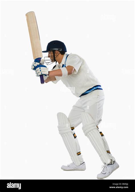 Sport cricket player action swinging hi-res stock photography and ...