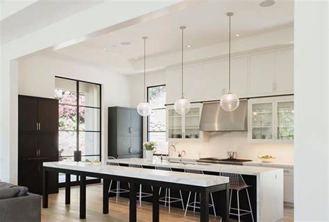 Open Kitchen And Living Room With White Walls