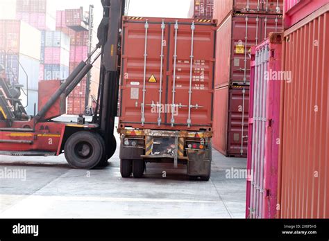 Forklift Truck Cargo Handling Container Boxes In Logistics Shipping