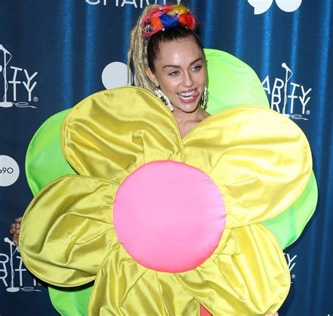 Miley Cyrus in Ridiculous Flower Dress and Green Peep-Toe Heels