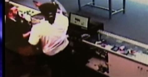 Caught In Tape Dramatic Store Robbery Cbs News