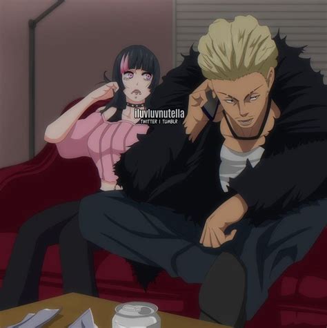 An Anime Character Sitting On A Couch Talking On A Cell Phone Next To