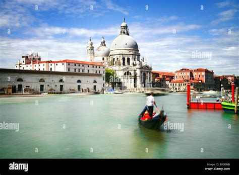 Gondola On Canal Grande With Basilica Di Santa Maria Della Salute In