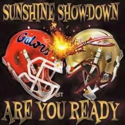 Two Football Helmets With The Words Sunshine Showdown Are You Ready