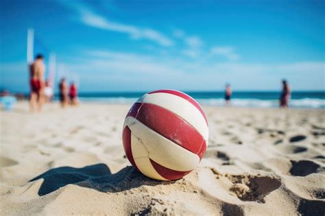 Premium Photo Red And White Volleyball Ball On Sandy Beach