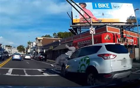 The Moment A Pedestrian Is Hit By A Car Then Gets Up And Walks Away