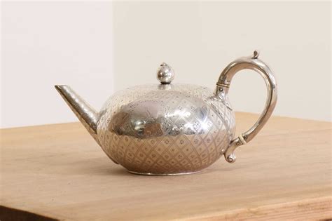 Lot 336 A Victorian Silver Teapot With Ivory