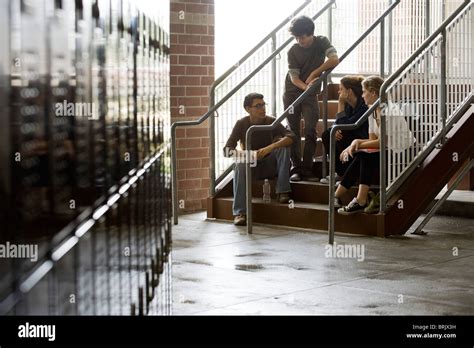 High school friends chatting together Stock Photo - Alamy