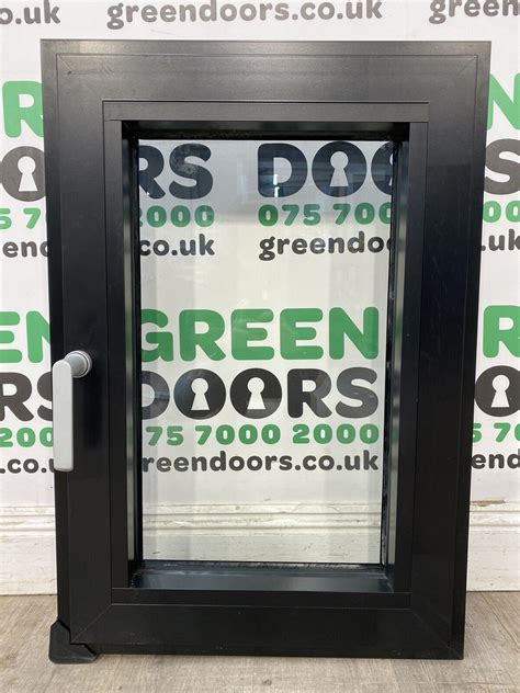 Schuco Aluminium Black Casement Window | Green doors