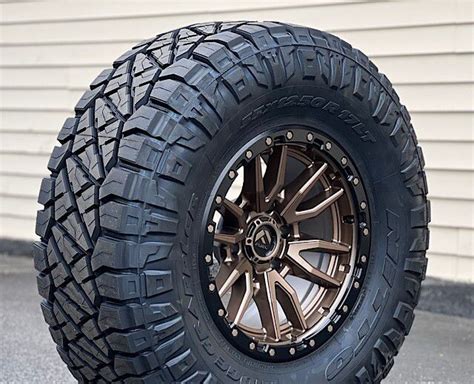 Wheel And Tire Package Fuel Rebel 18x9 6x1397 Bronze Wheels And 33x12