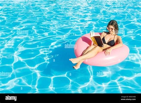 Woman In Bikini Reading Book Hi Res Stock Photography And Images Alamy