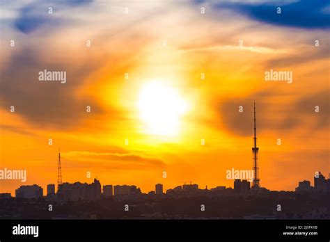 Modern city sunset panorama Stock Photo - Alamy