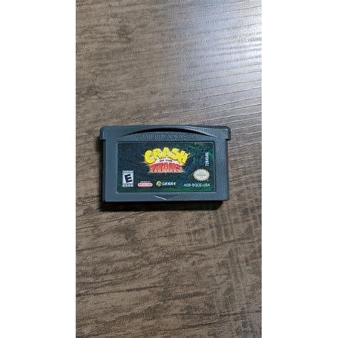 Jogo Gba Crash Of The Titans Original Game Boy Advance Escorrega o Preço