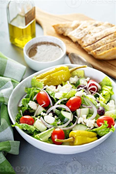 Greek salad with feta cheese 16116555 Stock Photo at Vecteezy