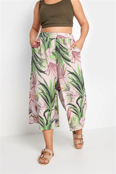 Yours Plus Size Pink Tropical Print Textured Cropped Trousers Yours Clothing