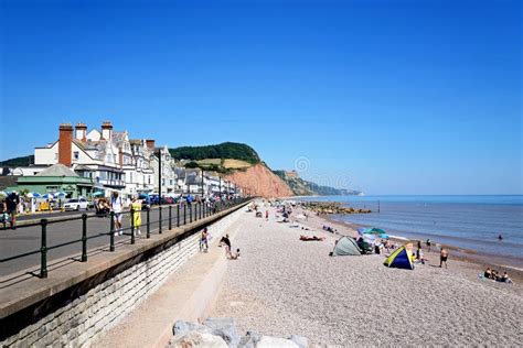 Tourists on the Beach and Promenade, Sidmouth, UK. Editorial Stock ...