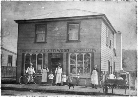 Group Standing Outside J A Hazelwoods General Store Main Street