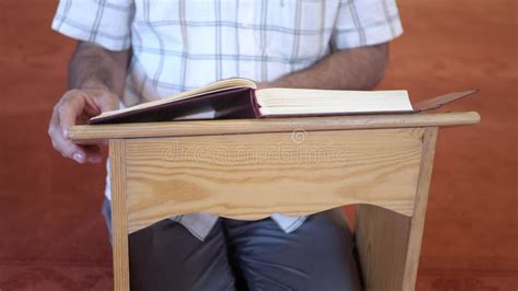 Muslim Man Hand Holding Holy Book Quran At Mosque Stock Footage Video