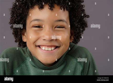 Portrait Of Smiling Boy Studio Shot Stock Photo Alamy