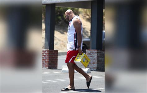 Hank Baskett Caught Buying Booze Amid Divorce From Kendra