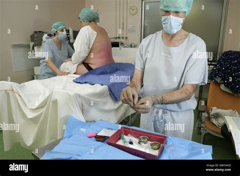 Pregnant woman epidural Stock Photo - Alamy