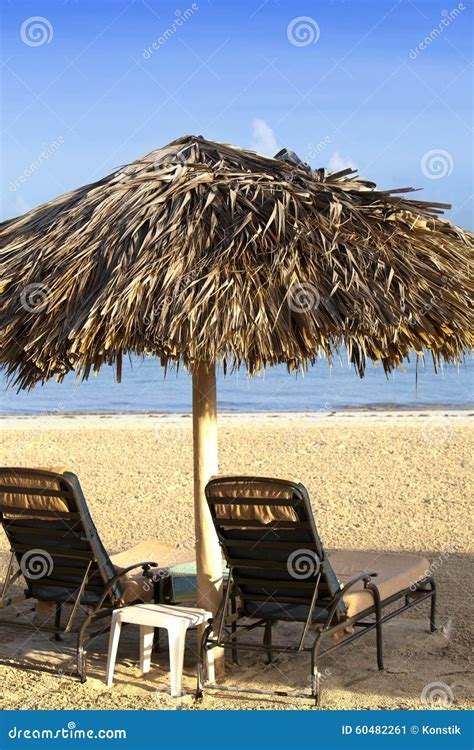 Umbrella And Chaise Lounges On A Beach Stock Image Image Of Sand