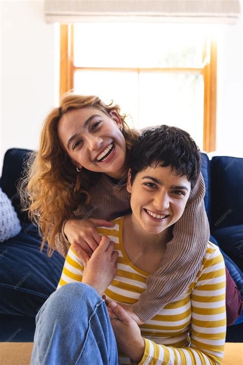 Premium Photo Portrait Of Happy Biracial Lesbian Couple Embracing And