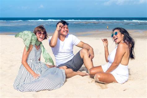 Group Of Multiracial Friends Having Fun On The Beach Of Tropical Bali