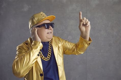 Funny Rich Man Wearing Gold Chain And Shiny Golden Jacket Putting On