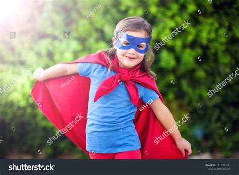 Superhero Kid Girl Against Green Background Stock Photo 1815503141