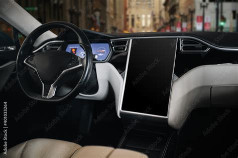 Modern and futuristic car interior. Expensive and luxury electric car ...