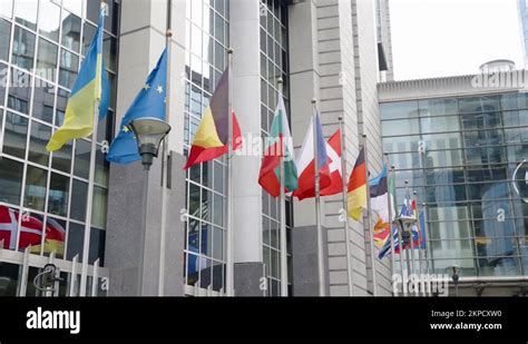 Row Of European Union Member States Flags Waving With The Wind Outside