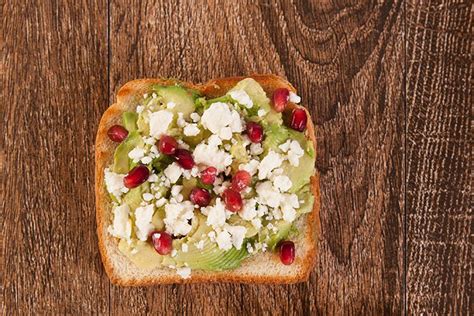 Avocado, Feta and Pomegranate Toast - we eat. live. do. well