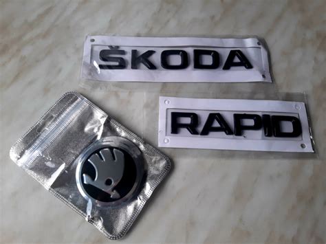 Правильные наклейки на колпачки дисков и буквы в чёрный — Skoda Rapid ...