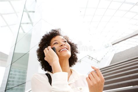 Close Up Attractive Middle Age African American Woman Talking On Mobile