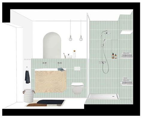 A Bathroom With Green Tiled Walls And White Fixtures Including A