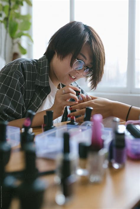 Girls Doing Their Nails At Home By Stocksy Contributor MaaHoo Stocksy