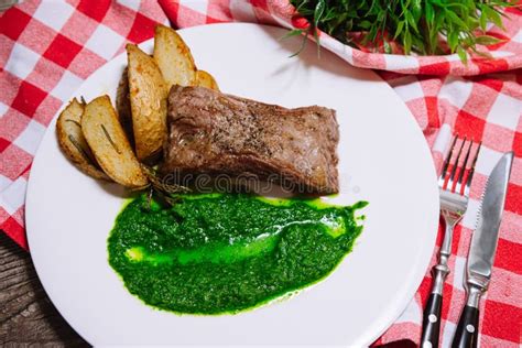 Picanha Steak With Green Chimichurri Sauce And Country Style Baked