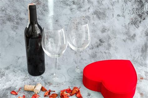 Premium Photo | Valentine's day elements. wine glasses, red wine bottle ...