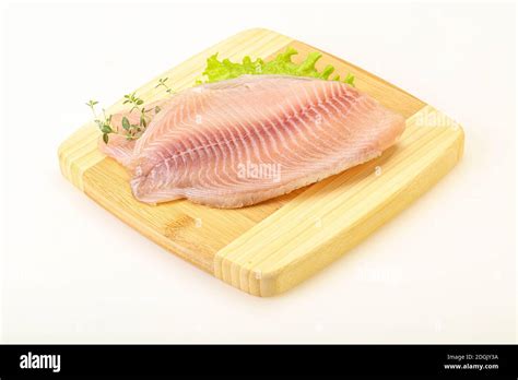 Raw Tilapia Fish Fillet For Cooking Stock Photo Alamy