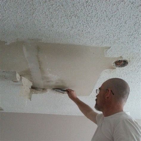 How To Remove Popcorn Ceilings In Nine Easy Steps Removing Popcorn Ceiling Popcorn Ceiling