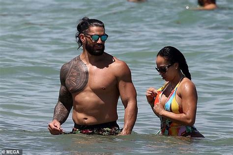 Wwe Star Roman Reigns Shows Off His Buff Physique While Wife Galina Becker Sizzles In Swimsuit