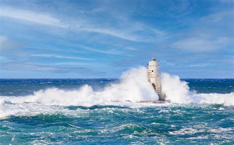 Premium Photo | The lighthouse of the mangiabarche shrouded by the ...