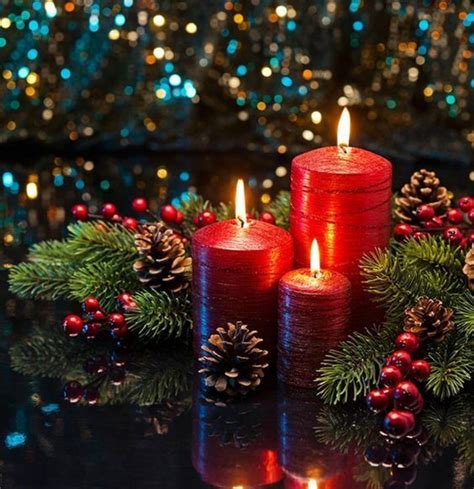 Three Lit Candles Surrounded By Christmas Decorations On A Table With