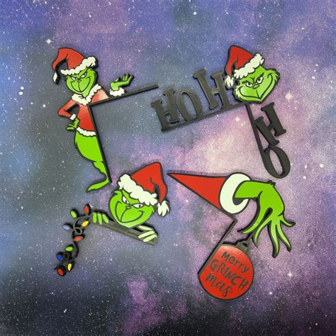 Grinch Themed Door Hangers Add A Touch Of Mischief To Your Festive