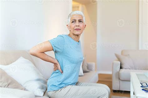 Matur Woman Suffering From Lower Back Pain Mature Woman Resting With