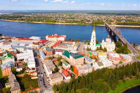 Aerial View Of Rybinsk Cityscape With Bridge Across Volga And Cathedral