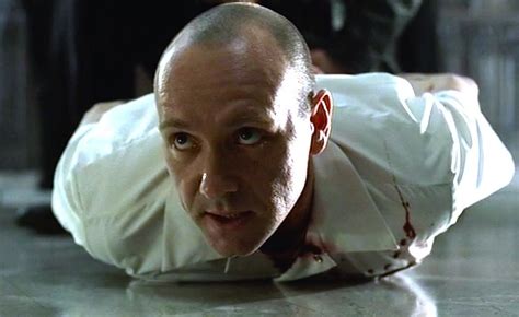 A Man In White Shirt And Tie Laying On Floor